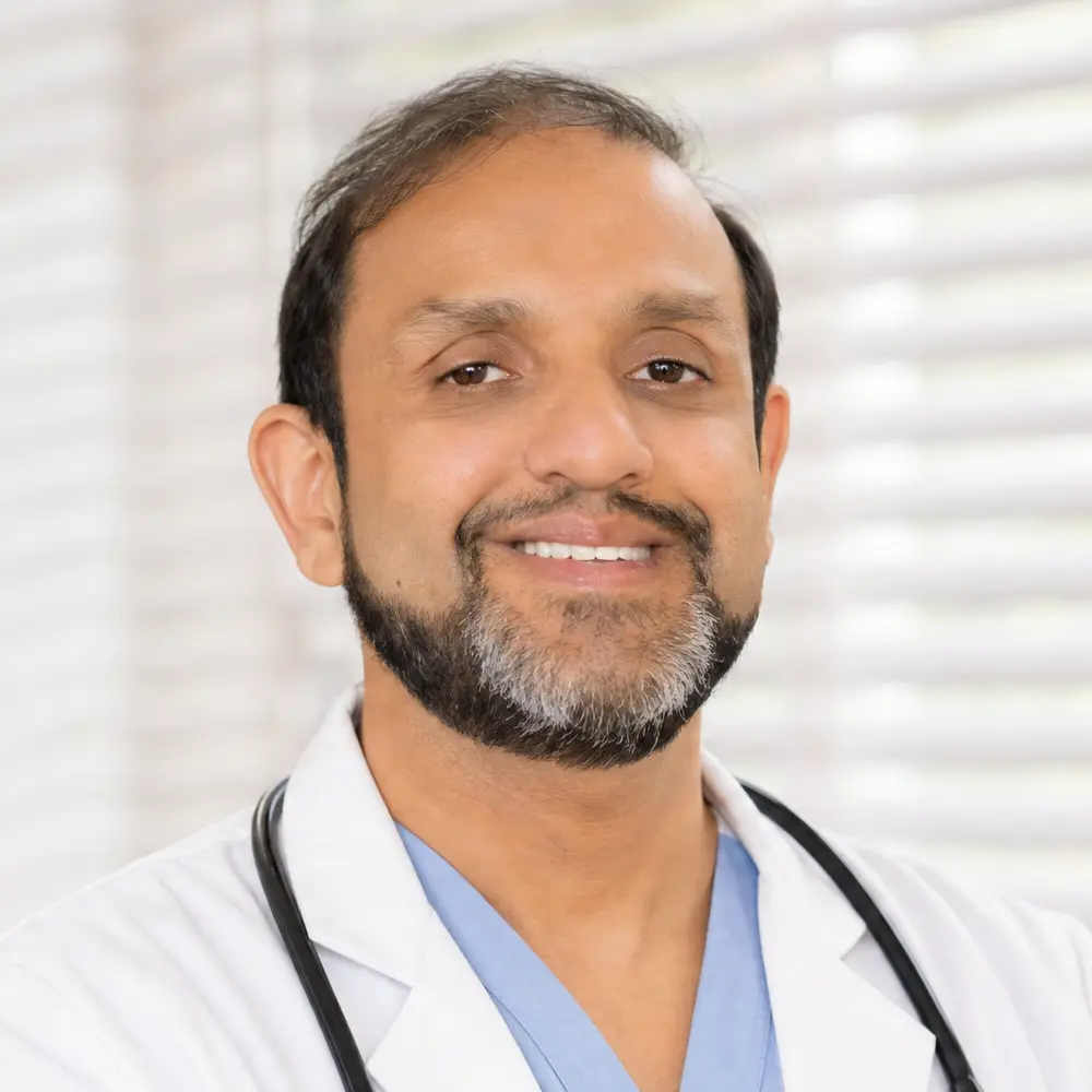 https://americafirsturgentprimarycare.com/wp-content/uploads/2026/05/dr-bilal-scrib1.webp